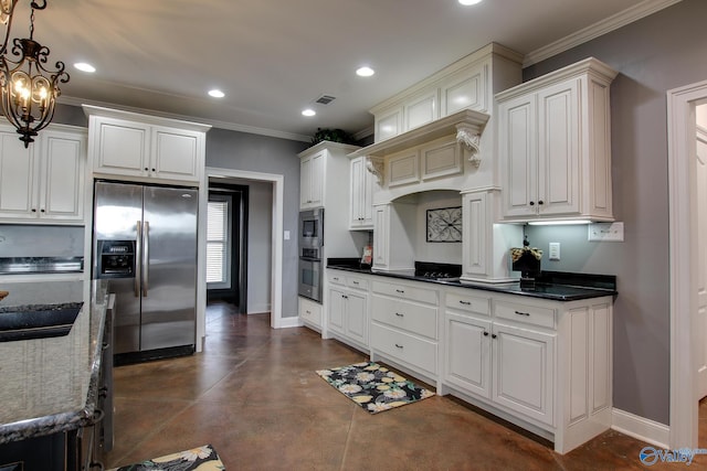 kitchen with decorative light fixtures, ornamental molding, appliances with stainless steel finishes, dark stone counters, and white cabinets