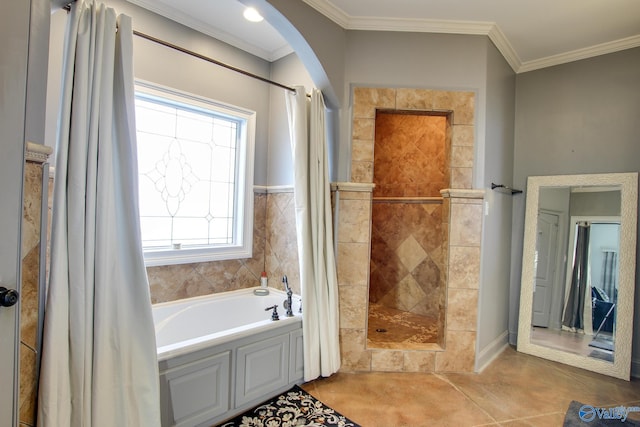 bathroom with shower with separate bathtub, ornamental molding, and tile patterned floors