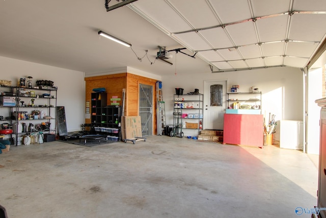 garage featuring a garage door opener