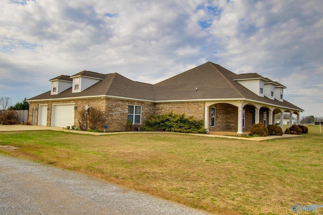 cape cod house with a garage, a front yard, and a porch