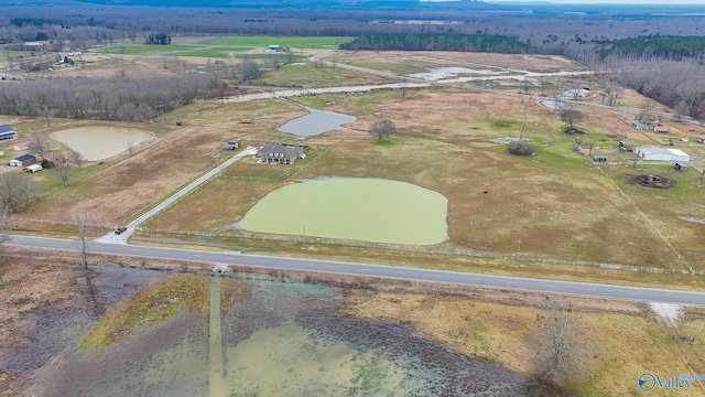 birds eye view of property featuring a rural view