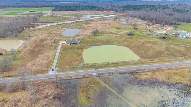 aerial view featuring a water view and a rural view