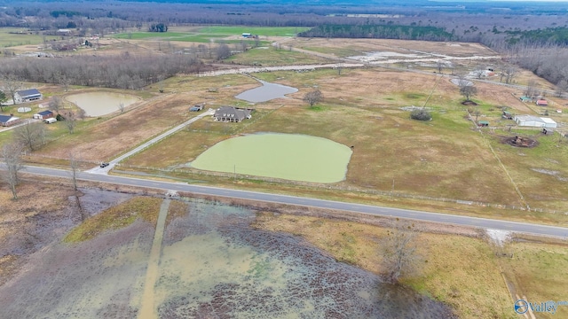 birds eye view of property featuring a rural view