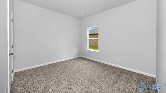 view of carpeted spare room