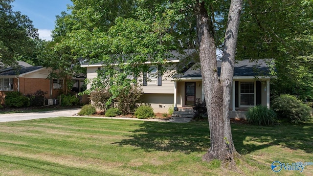 10012 Allison Dr, Huntsville, AL 35803 - tri-level home featuring a front lawn, crawl space, and concrete driveway