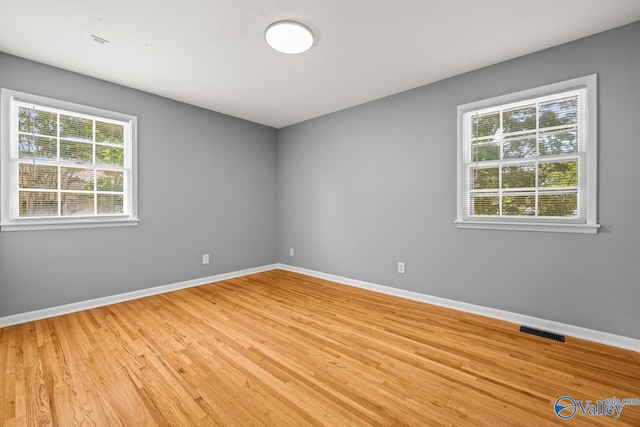 10012 Allison Dr, Huntsville, AL 35803 - unfurnished room with light wood-type flooring and baseboards