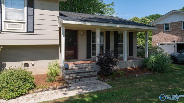 10012 Allison Dr, Huntsville, AL 35803 - view of exterior entry with covered porch and brick siding