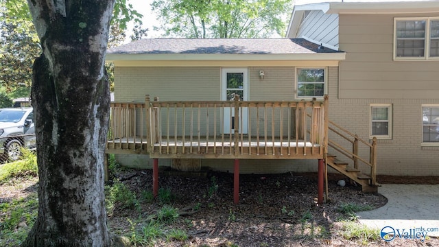 10012 Allison Dr, Huntsville, AL 35803 - back of house with brick siding, a wooden deck, stairway, and a shingled roof