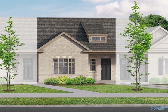 433 Lando Cain Rd, Hartselle, AL 35640 - view of front of house with a shingled roof, brick siding, and a front lawn