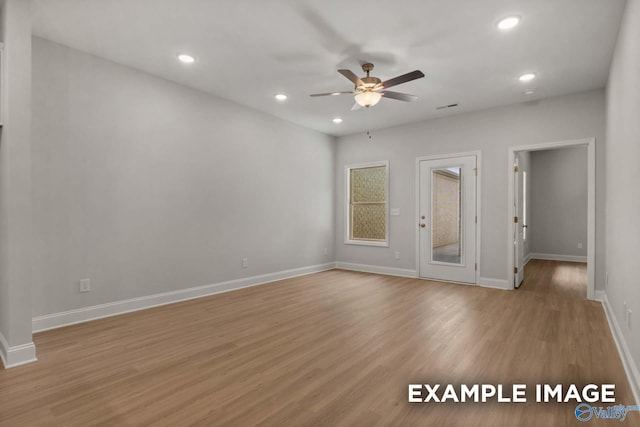 433 Lando Cain Rd, Hartselle, AL 35640 - spare room with ceiling fan, recessed lighting, light wood-style floors, and baseboards