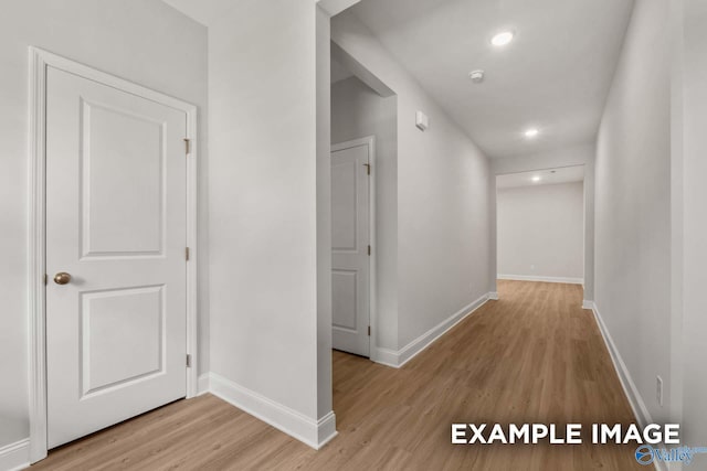 433 Lando Cain Rd, Hartselle, AL 35640 - hall featuring light wood-style floors, baseboards, and recessed lighting