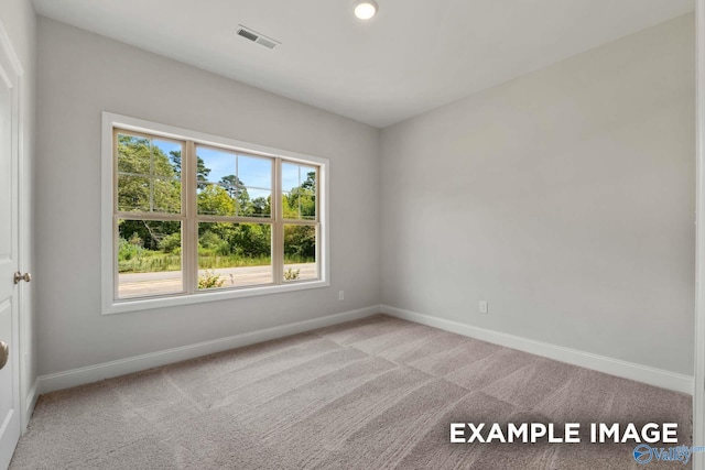 433 Lando Cain Rd, Hartselle, AL 35640 - unfurnished room featuring baseboards, light colored carpet, and recessed lighting
