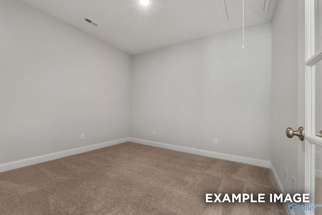 433 Lando Cain Rd, Hartselle, AL 35640 - unfurnished room with attic access, carpet floors, and baseboards