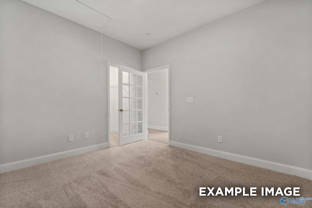 433 Lando Cain Rd, Hartselle, AL 35640 - carpeted spare room with attic access and baseboards