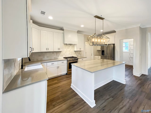 kitchen with appliances with stainless steel finishes, decorative backsplash, custom exhaust hood, dark hardwood / wood-style flooring, and ornamental molding