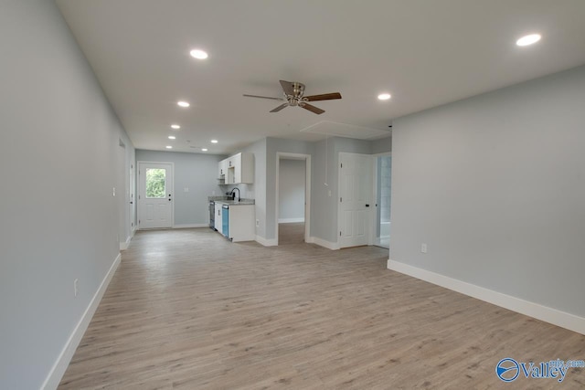 3913 Pine Ave SW, Huntsville, AL 35805 - unfurnished living room with recessed lighting, baseboards, light wood finished floors, and ceiling fan