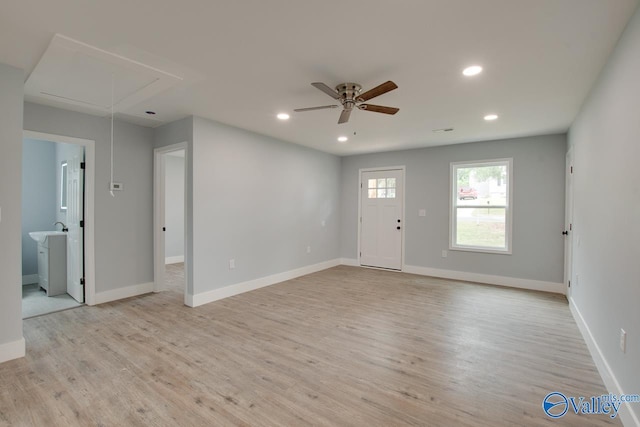 3913 Pine Ave SW, Huntsville, AL 35805 - unfurnished living room with a ceiling fan, attic access, recessed lighting, and light wood-style flooring