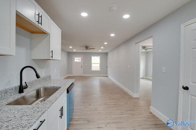 3913 Pine Ave SW, Huntsville, AL 35805 - kitchen with recessed lighting, a ceiling fan, a sink, and light wood-style flooring