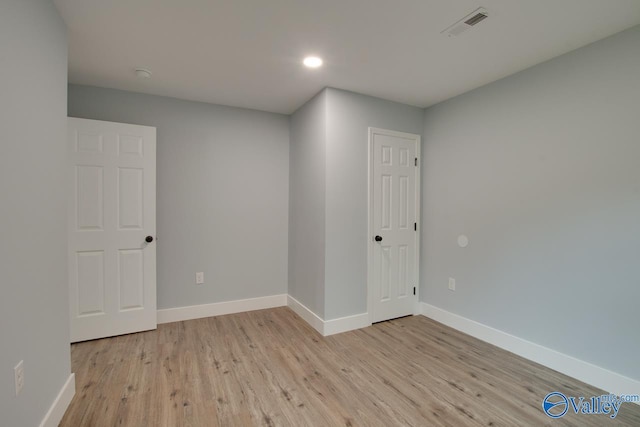 3913 Pine Ave SW, Huntsville, AL 35805 - empty room featuring baseboards, recessed lighting, light wood-style flooring, and visible vents