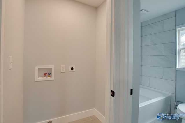 3913 Pine Ave SW, Huntsville, AL 35805 - laundry room featuring baseboards, hookup for an electric dryer, laundry area, and hookup for a washing machine