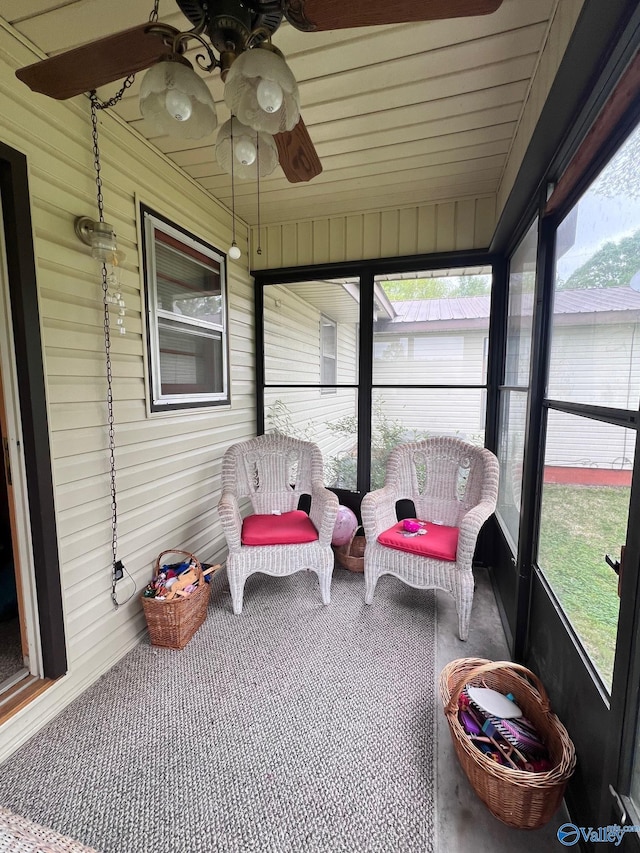 sunroom / solarium with ceiling fan