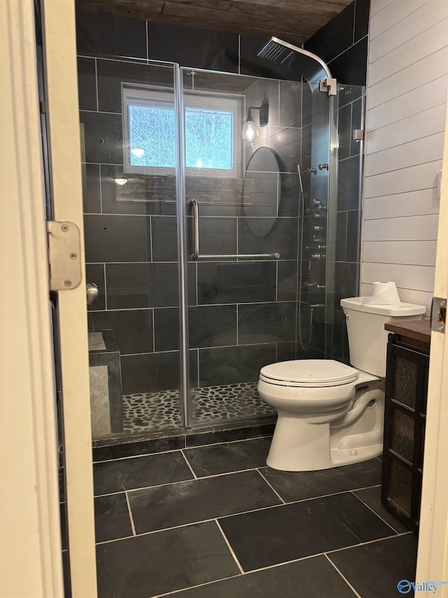 bathroom featuring tile patterned floors, a shower with door, wooden ceiling, and toilet