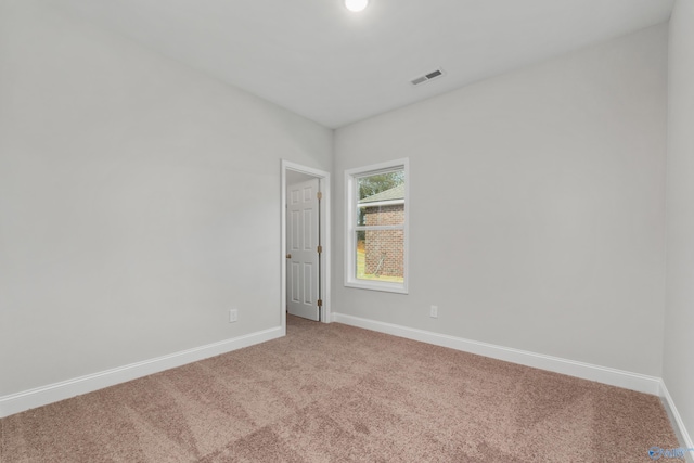 view of carpeted spare room