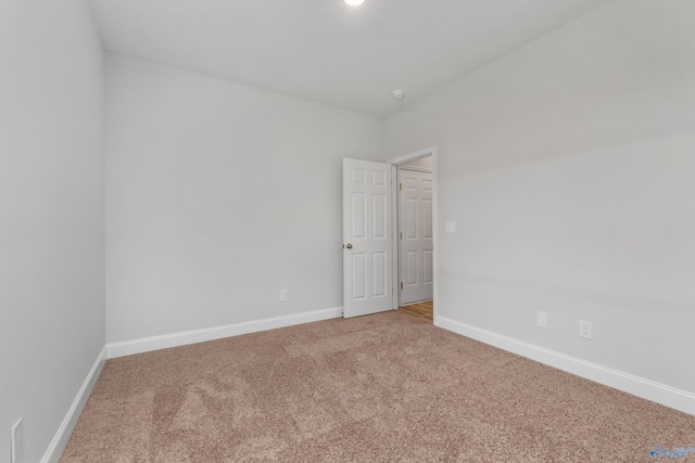 empty room featuring carpet floors