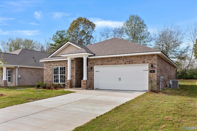 view of front facade featuring a garage, central AC, and a front yard