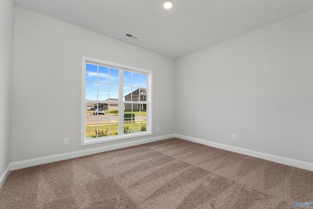 view of carpeted spare room