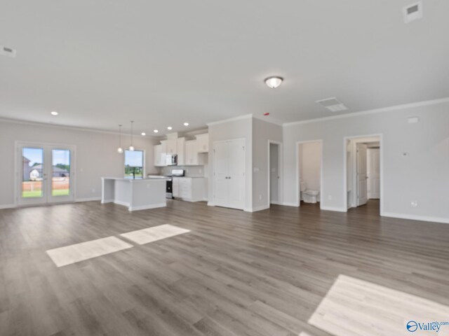 bathroom featuring tile patterned flooring, walk in shower, and vanity