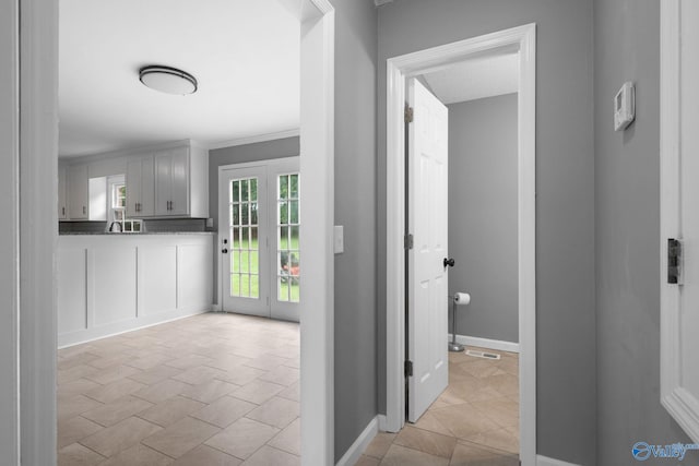 127 Patdean Dr, Huntsville, AL 35811 - corridor featuring light tile patterned floors and crown molding