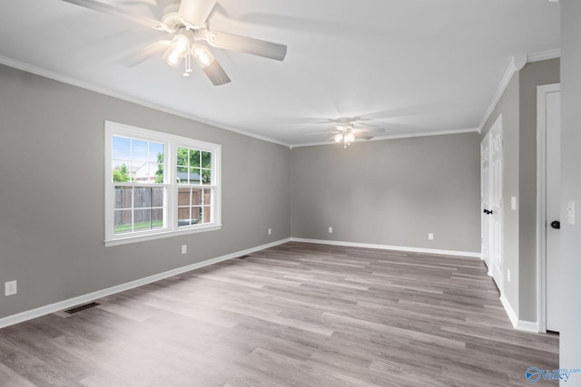 127 Patdean Dr, Huntsville, AL 35811 - spare room with a ceiling fan, ornamental molding, and wood finished floors