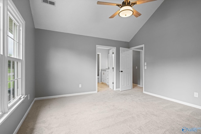 127 Patdean Dr, Huntsville, AL 35811 - unfurnished bedroom featuring light colored carpet, high vaulted ceiling, ensuite bathroom, and a ceiling fan