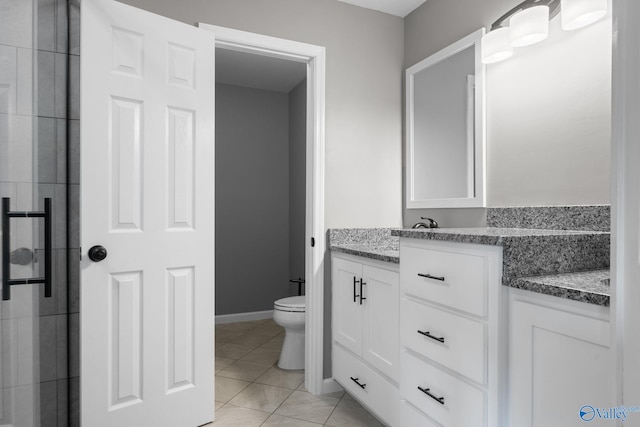 127 Patdean Dr, Huntsville, AL 35811 - full bath with vanity, tile patterned flooring, and a tile shower