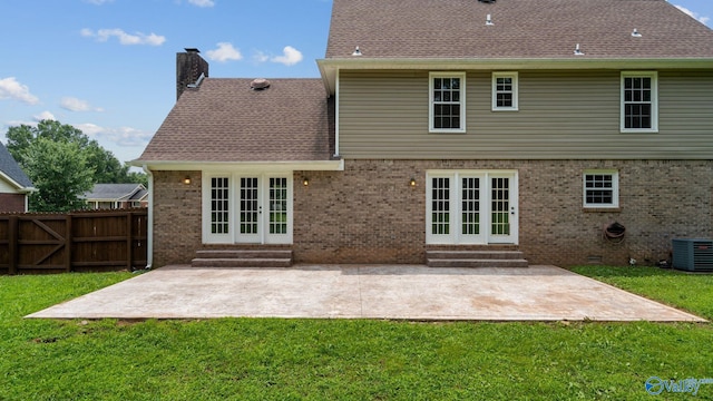 127 Patdean Dr, Huntsville, AL 35811 - back of property featuring french doors, entry steps, a chimney, and brick siding