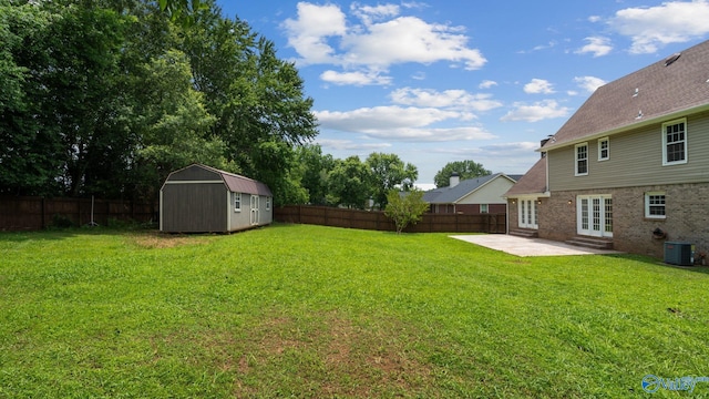 127 Patdean Dr, Huntsville, AL 35811 - fenced backyard with a patio, a storage unit, and entry steps