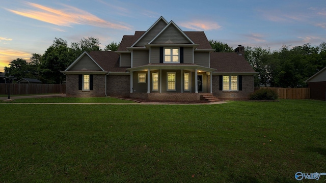 127 Patdean Dr, Huntsville, AL 35811 - view of front facade featuring brick siding, a chimney, and covered porch