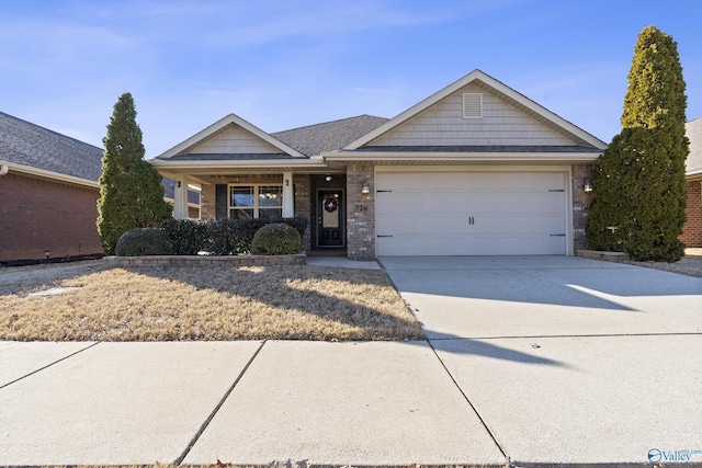 ranch-style home featuring a garage