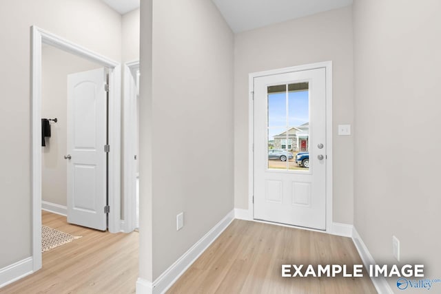 doorway with light hardwood / wood-style floors