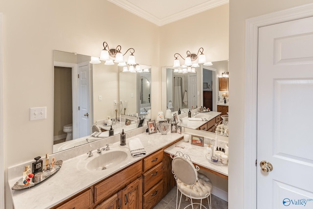 227 Key Turney Rd, Falkville, AL 35622 - bathroom featuring vanity, ornamental molding, and toilet
