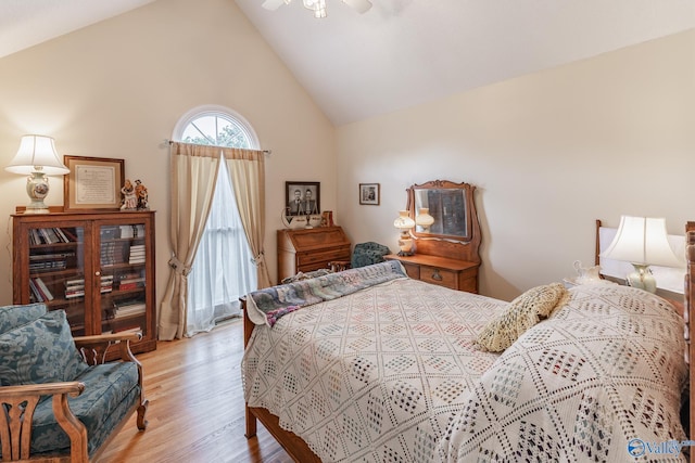 227 Key Turney Rd, Falkville, AL 35622 - bedroom featuring ceiling fan, high vaulted ceiling, and light hardwood / wood-style flooring