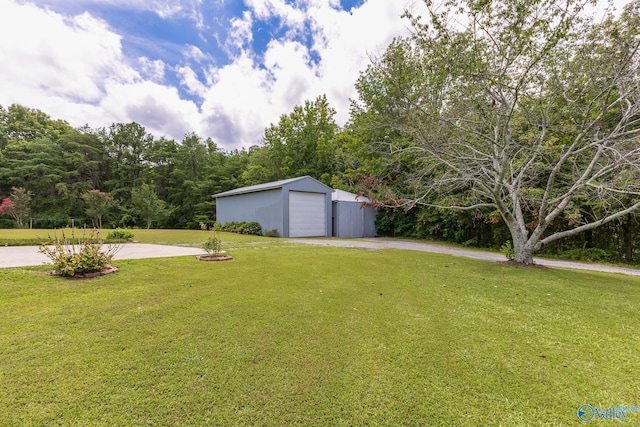 227 Key Turney Rd, Falkville, AL 35622 - view of yard featuring an outbuilding and a garage