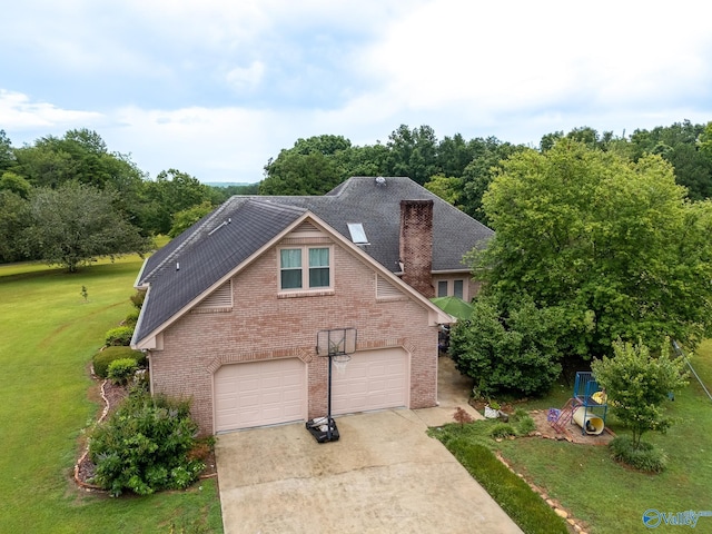 227 Key Turney Rd, Falkville, AL 35622 - view of front of property featuring a garage and a front lawn