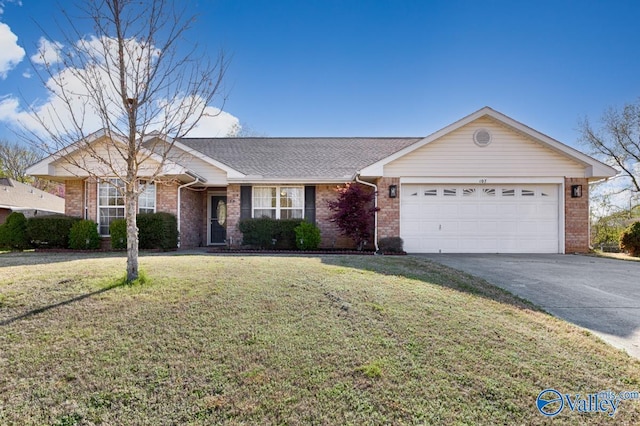 107 Harvest Glen Ln, Harvest, AL 35749 - ranch-style home featuring concrete driveway, brick siding, a front yard, and a garage
