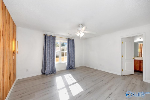 107 Harvest Glen Ln, Harvest, AL 35749 - spare room with baseboards, light wood-style flooring, and ceiling fan