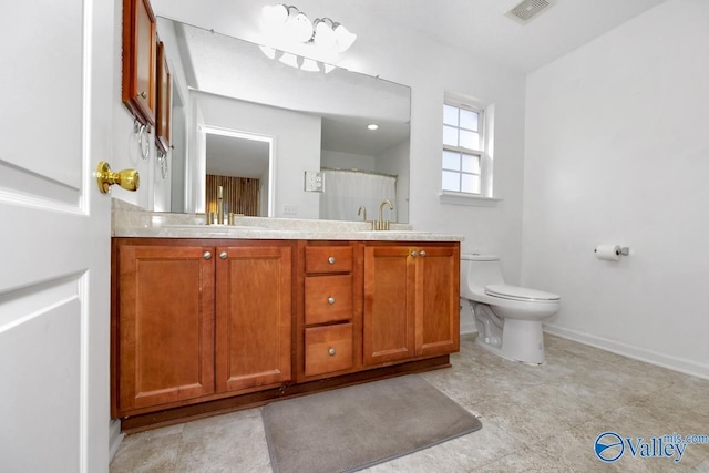 107 Harvest Glen Ln, Harvest, AL 35749 - bathroom featuring double vanity, toilet, a sink, visible vents, and a shower
