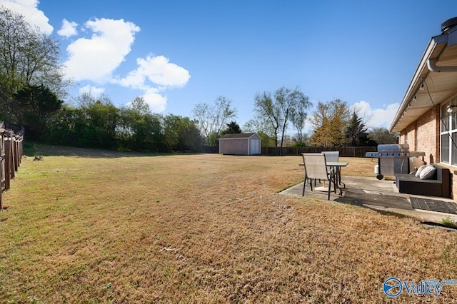 107 Harvest Glen Ln, Harvest, AL 35749 - view of yard with a fenced backyard, an outdoor structure, a patio, and a storage shed