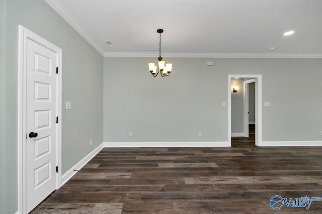 unfurnished room with crown molding, a notable chandelier, and dark hardwood / wood-style flooring