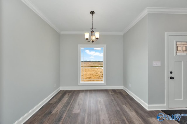 unfurnished dining area with an inviting chandelier, ornamental molding, and dark wood-type flooring